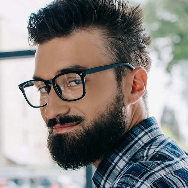 Young Successful Seo Manager Sitting At Workplace Q74QKAM